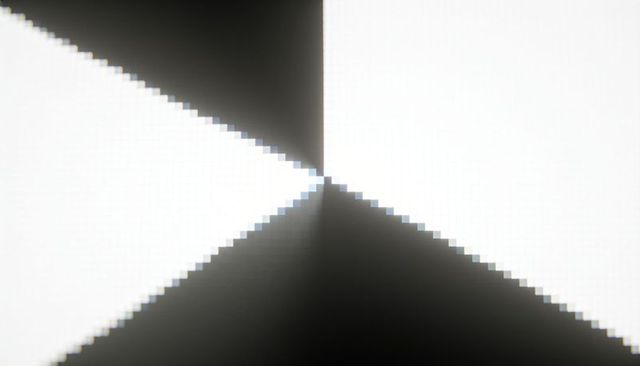 Monochrome x-shaped graphic forming stepped diagonal wedges with central halo and radial fade