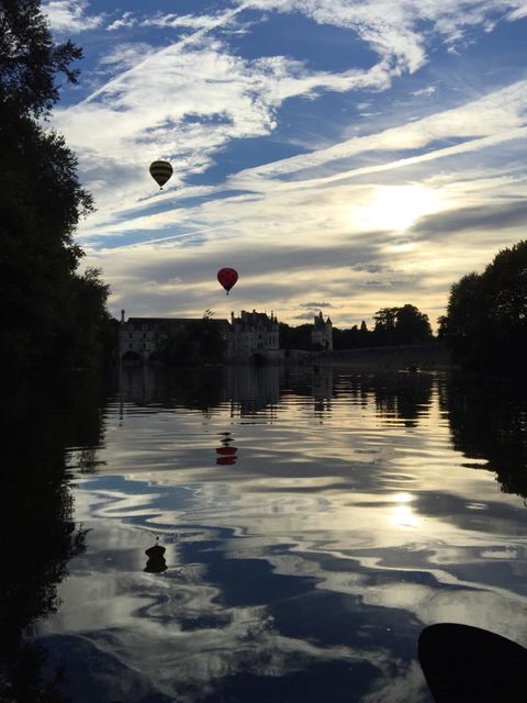 Hot Air Balloons Reflecting on Tranquil Lake at Sunset - Download Free Stock Images Pikwizard.com