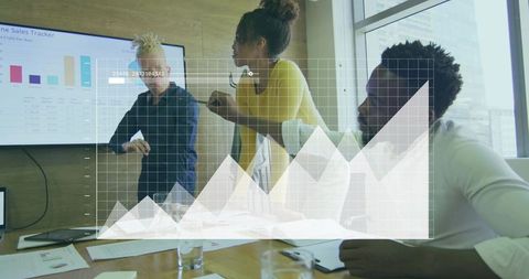 Energetic Business Team Analyzing Market Trends in Modern Office