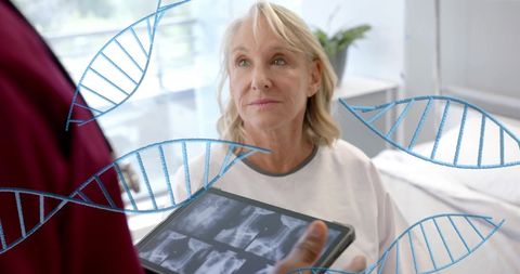 Doctor Consulting Senior Patient with Medical DNA Interface