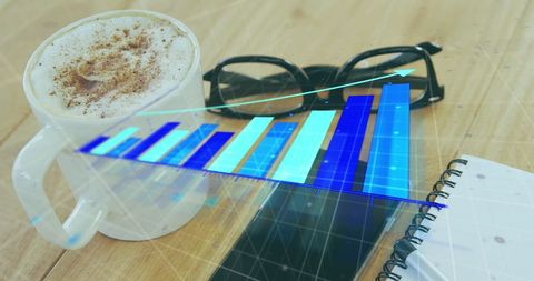 Business Growth Vision with Coffee and Financial Graph