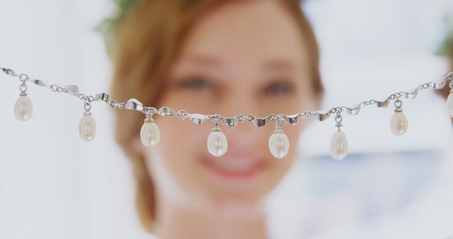 Woman Holding Delicate Pearl Necklace Close Up - Download Free Stock Images Pikwizard.com