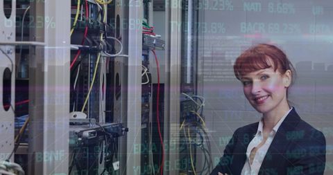 Smiling Female Engineer Overseeing Server Data Processing - Download Free Stock Images Pikwizard.com