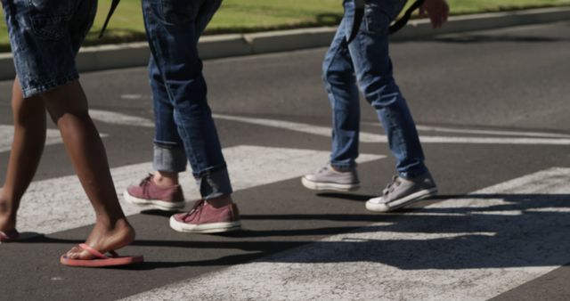 Feet of Teenagers Crossing Street at Pedestrian Crosswalk - Download Free Stock Images Pikwizard.com