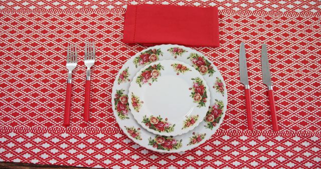 Vintage Floral Dinnerware on Red Patterned Tablecloth - Download Free Stock Images Pikwizard.com