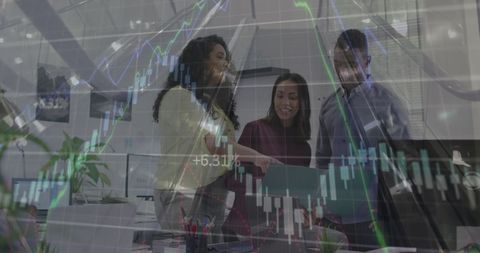 Business Team Analyzing Financial Market Trends in Office