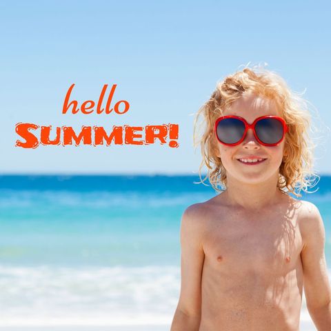 Cheerful Boy With Sunglasses at Sunny Beach Celebrating Summer