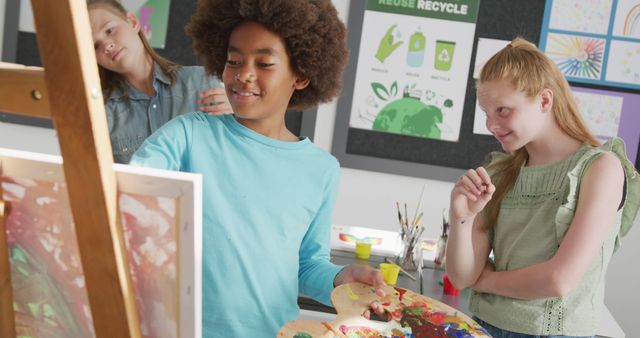 Children participating in an art class, collaborating and enjoying creative activities. Could be used for educational content, promoting art programs, or illustrating the benefits of creative activities for children.