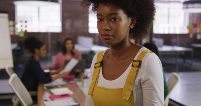 Confident Young Businesswoman in Modern Office Setting - Download Free Stock Images Pikwizard.com