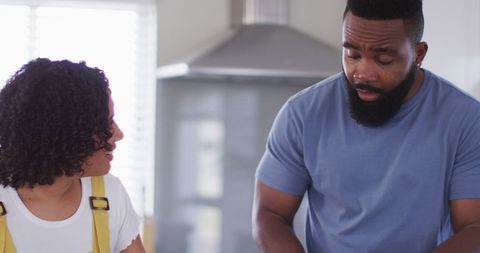 Couple Holiday Pizza Making in Kitchen
