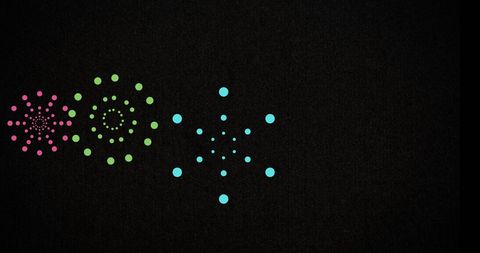 Digital Fireworks with Vibrant Spirals Against Dark Background