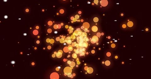 Orange Light Particles Explosion on Black Background