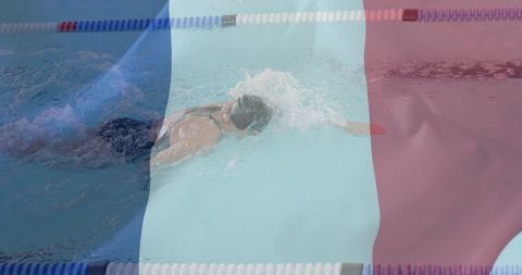 Competitive woman swimmer profiled against french flag overlay