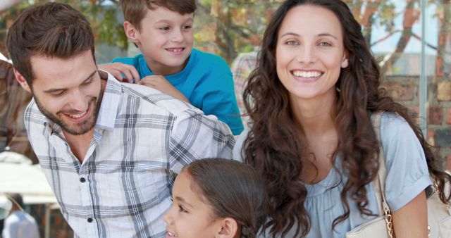 Happy Family Smiling Outdoors on a Sunny Day - Download Free Stock Images Pikwizard.com