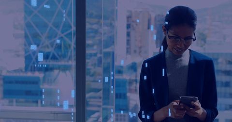 Asian businesswoman connecting globally with smartphone technology