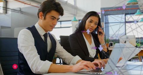Business team collaborating on laptop and smartphone with analytics data overlay