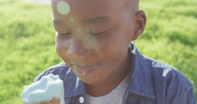 Happy Child Enjoying Ice Cream Outdoors on a Sunny Day - Download Free Stock Images Pikwizard.com