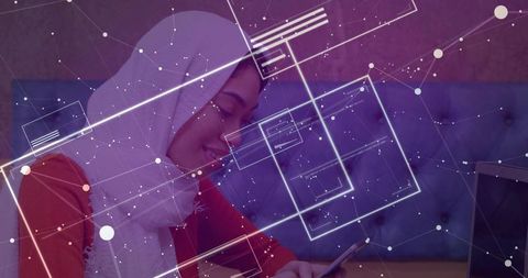 Muslim woman using smart device with digital network overlay