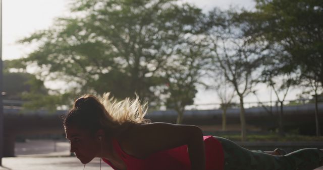 Woman Exercising Outdoors Doing Push-Ups at Sunrise - Download Free Stock Images Pikwizard.com