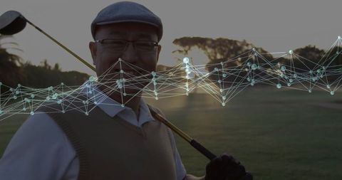 Smiling senior golfer on green field with digital network graphic