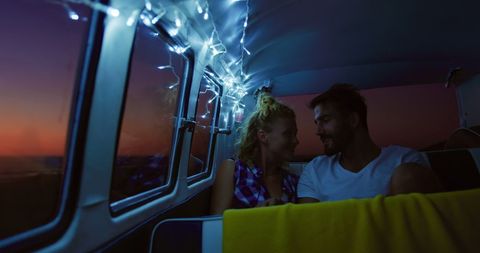 Romantic Getaway in Festively Lit Campervan at Night