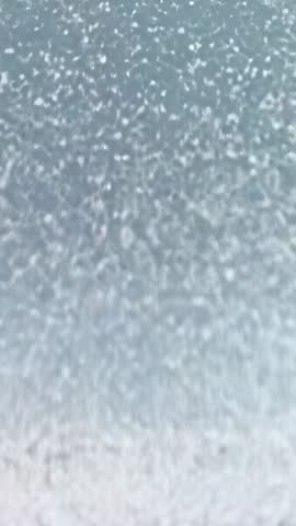 Swirling Snow Veiling Silver Clock Face in Minimalist Winter Vertical Video