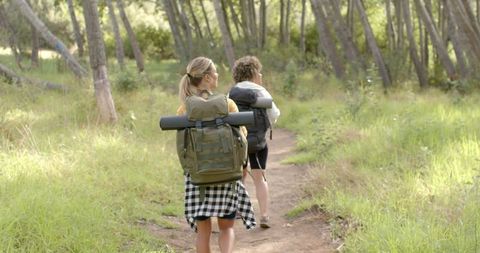 Women Enjoying Nature Hike in Scenic Forest Trail