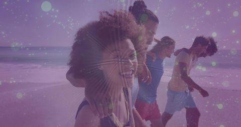 Friends walking arm-in-arm on beach laughing with purple bokeh overlay for summer campaigns