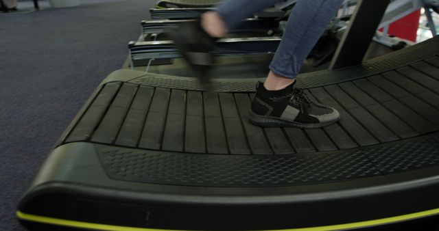 Close-Up of Person Running on Treadmill in Gym - Download Free Stock Images Pikwizard.com