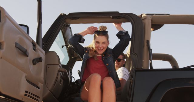 Young couple enjoying road trip in convertible jeep - Download Free Stock Images Pikwizard.com