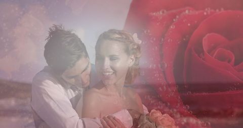 Romantic Newlyweds Embracing at Beach with Rose Overlay