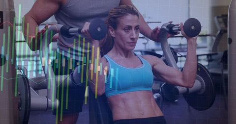Female athlete pressing shoulder-press machine with trainer spotting and fitness data overlay