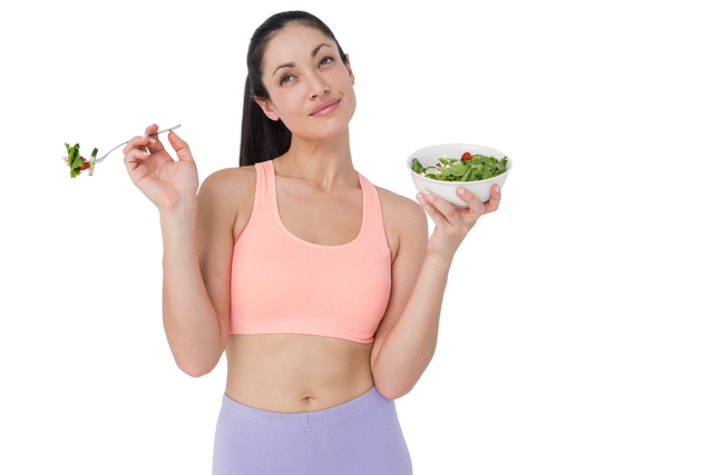 Woman In Workout Attire Holding Salad Bowl And Fork On Transparent Background - Download Free Stock Videos Pikwizard.com