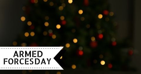 Blurry lights with armed forces day greeting