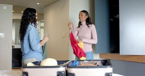 Friends Packing Suitcases for Exciting Travel Adventure