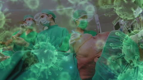 Surgeons Performing in Theater with COVID-19 Virus Overlay