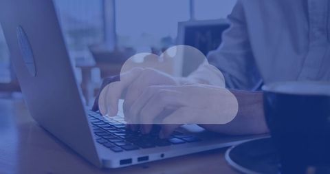 Cloud computing concept with hands typing on laptop