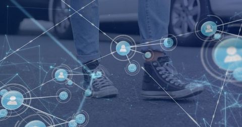 Digital Network Overlay on Street Scene with Person Walking