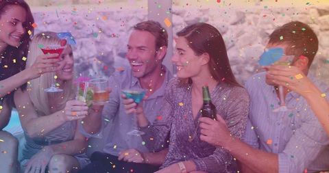 Diverse Friends Celebrating with Festive Cocktails