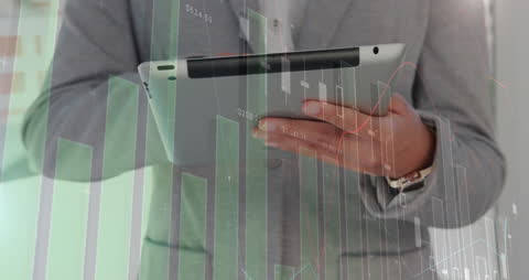 Businessman Analyzing Financial Data on Tablet with Overlay