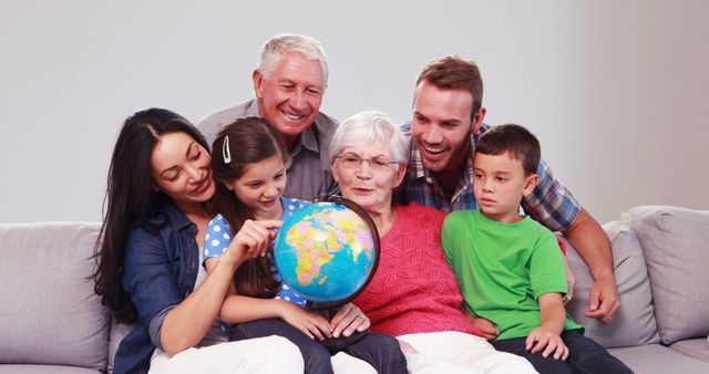 Modern Family Celebrating Diverse Generations with World Globe - Download Free Stock Images Pikwizard.com