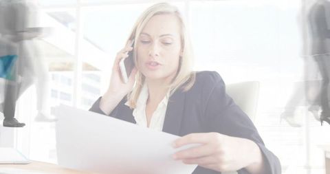 Calling and reviewing documents in bright office, businesswoman multitasking at urban desk