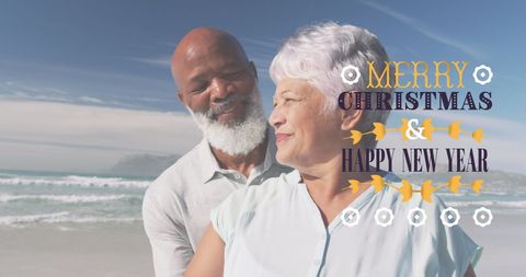Elderly Couple Celebrating Christmas on Sunny Beach