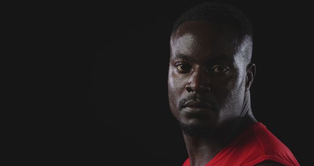 Portrait of Determined African American Man in Red Shirt on Black Background - Download Free Stock Images Pikwizard.com