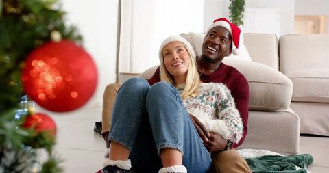 Romantic Couple Celebrating Christmas in Cozy Living Room