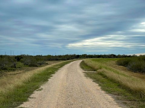 Tranquil country road under overcast sky