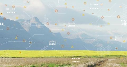 Canola Field Stretching Across Valley with Smart-Farming HUD Overlay and Mountain Backdrop