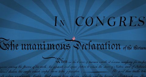 American flag illumination over historical declaration text
