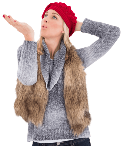 Trendy winter blonde blowing transparent kiss in stylish outfit