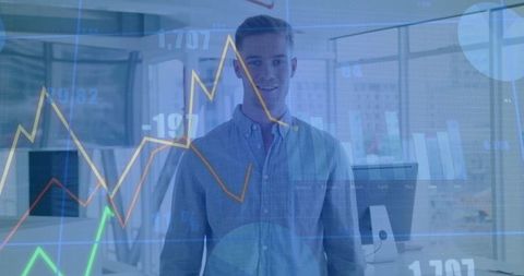 Young Professional Analyzing Innovative Finance Data in Modern Office